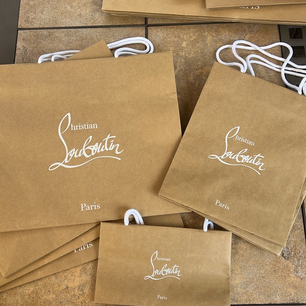 Set of 7 Christian Louboutin shopping bags
